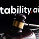 A gavel on top of a laptop with the screen reading 'Stability AI'